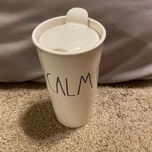 Rae Dunn coffee mug with lid. Never used